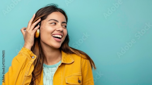 Young beautiful latin woman wearing casual clothes smiling with hand over ear listening an hearing to rumor or gossip. deafness concept.  photo
