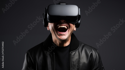 Happy young man in glasses of virtual reality. Augmented reality, future technology concept, VR.  © Anthichada