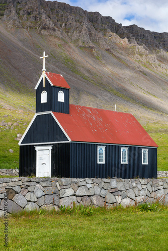 the famous Saurbæjarkirkja wooden, church at the Rauðisandur Beach in iceland. photo