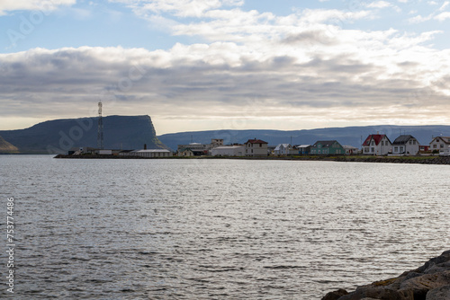 look over the small town Patreksfjörður in iceland at sunset in summer. photo