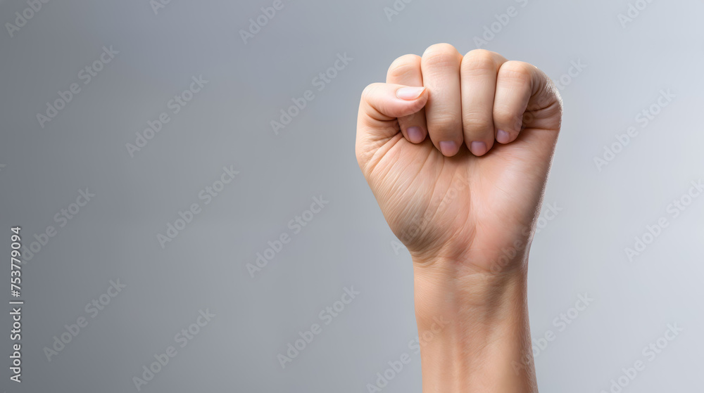 Closeup of a woman clenched fist on a white backdrop copy space. Generative AI Closeup of a woman clenched fist on a white backdrop copy space. Generative AI
