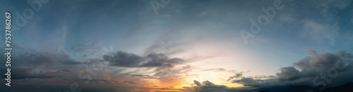 Panoramic View of Cloudscape during a colorful sunset or sunrise. © edb3_16