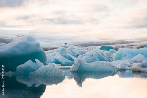 Icy lagoon with floating icebergs and glaciers in Iceland  photo
