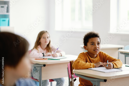 Boy showing thirst for knowledge  photo