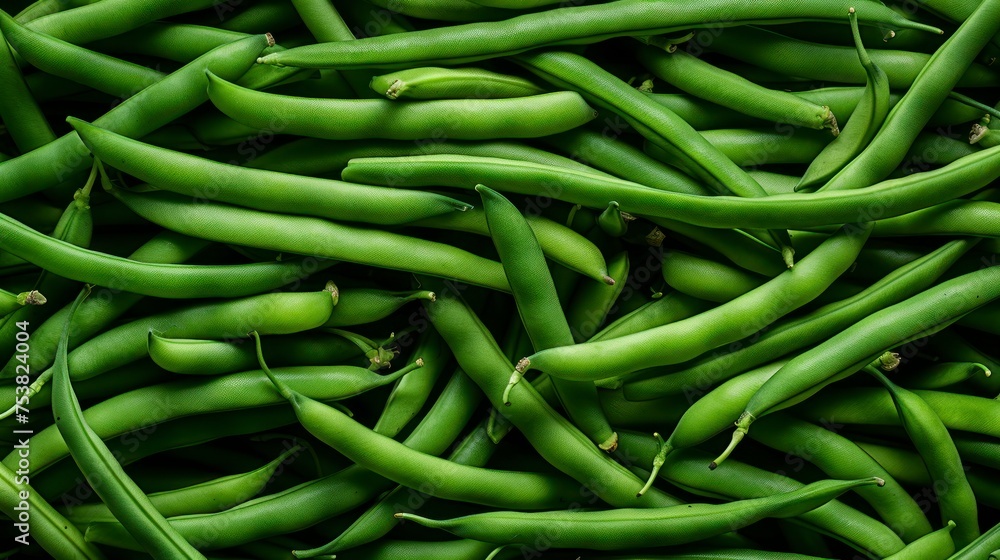 Green beans with water drops on a black background. Top view. Green beans with water drops on a black background. Top view.