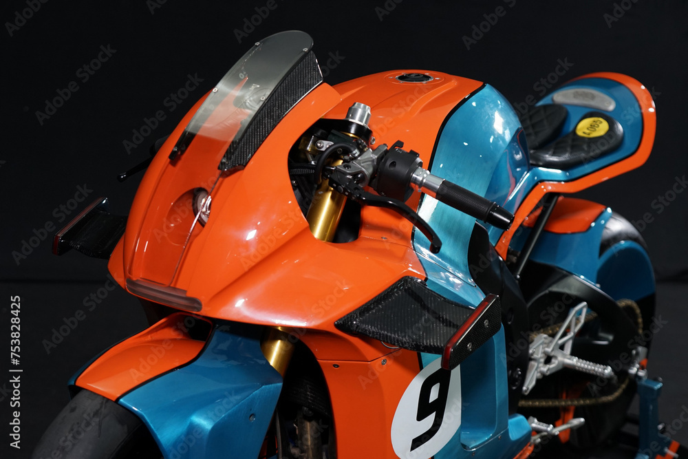Fototapeta premium Custom handmade motorcycle cafe racer style with blue and orange color with aluminium detail