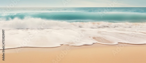 Soft wave of the sea on the sandy beach. Seascape background