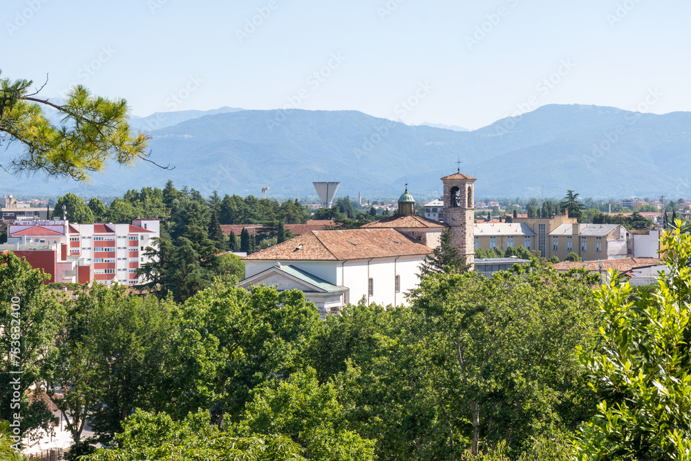 Landscape of the italian mountain and the city from the top of the park of the castle of Udine, Italy. Landscape of the italian mountain and the city from the top of the park of the castle of Udine, Italy.