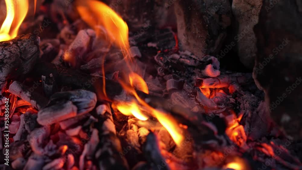 Close-Up of Dying Flames and Embers in Campfire. Shallow dof. Close-Up of Dying Flames and Embers in Campfire. Shallow dof.