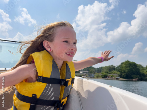 Portrait  happy young girl with smile on lake boat  photo