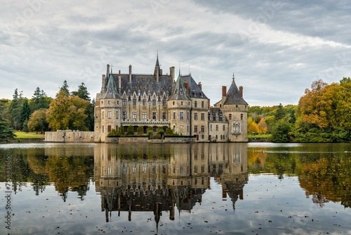 Majestic Marvel: Delving into the Enchanting History and Grandeur of a Lakeside Castle Amidst Scenic Splendor