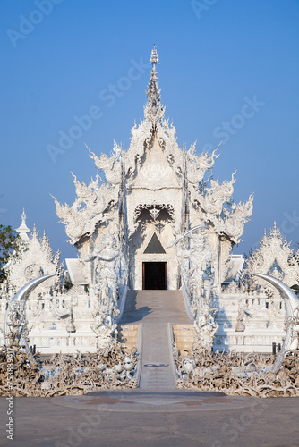 CHIANG RAI, THAILAND - FEBRUARY 2019: wat Rong Khun The famous White Temple in Chiang Rai, Thailand photo