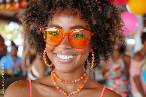 Afro woman in orange glasses