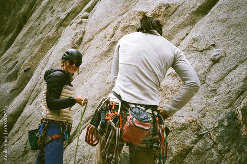 Rock climbers outside preparing photo