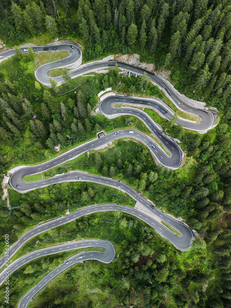 Aerial view of serpentine road in Swiss Alps Aerial view of serpentine road in Swiss Alps