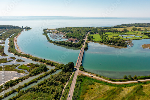 Aerial view of a bridge joining two islands in the sea photo
