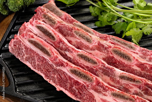 Wallpaper Mural Savory Delight: 4K Ultra HD Image of Close-Up Raw Beef Ribs Torontodigital.ca