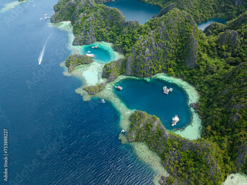 Top view of Lagoons with tour boats. Coron, Palawan. Barracuda Lake. Philippines.