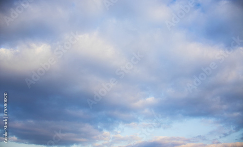 sky with clouds,Cumulus sunset clouds with sun setting down, sky with clouds, background image  © Olga