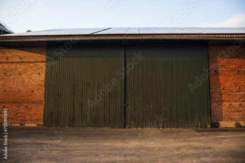 Large gates of warehouse doors , garage for tarctor on the farm
