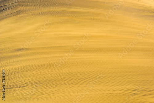 Afternoon Glow: 4K Ultra HD Image of Sand Dune with Afternoon Light photo