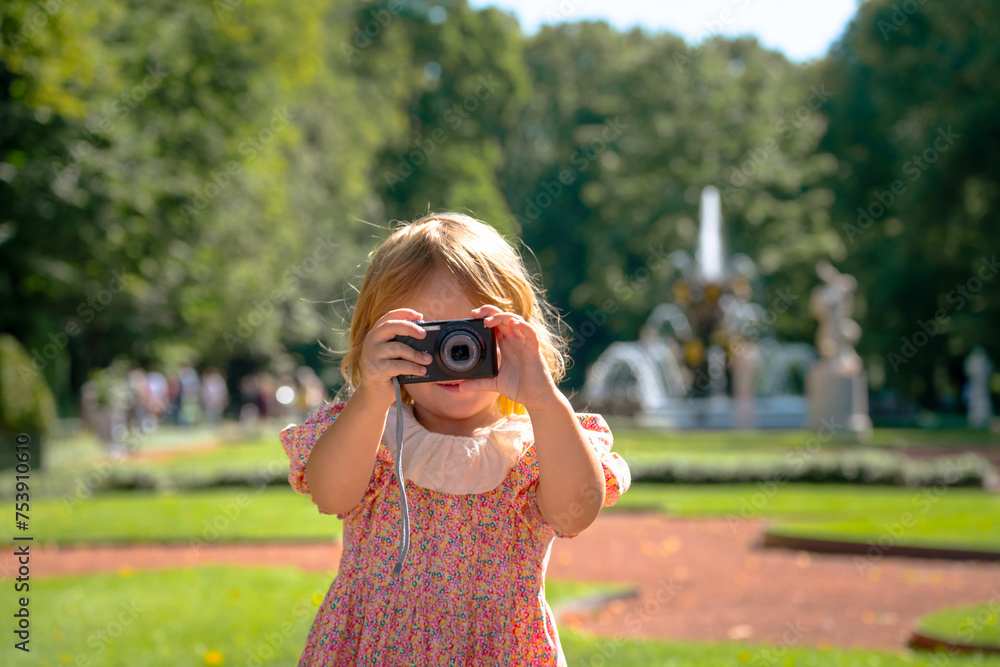 little gir using camera little gir using camera