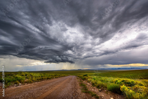 Nature's Drama: 4K Ultra HD Image of Beautiful Natural View of Thundercloud with Rain on the Plains Road