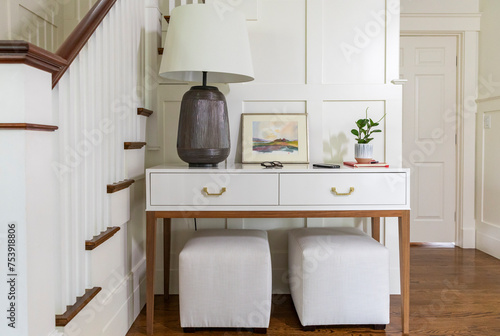 Stairway in Contemporary Home with white desk in foyer  photo