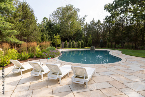 Residential luxury Home outdoor terrace and swimming pool chair  photo
