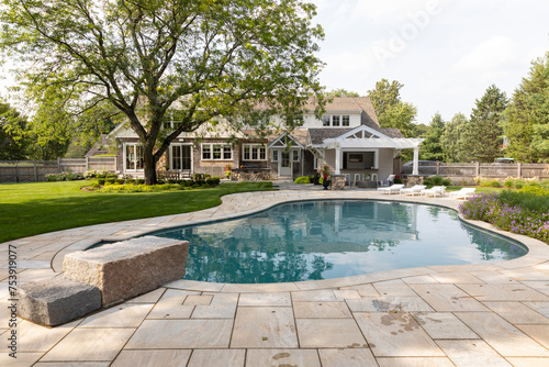 Residential luxury Home outdoor swimming pool with diving board  photo