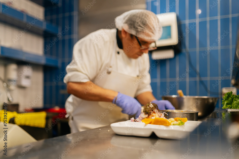 Chef serving ceviche Chef serving ceviche