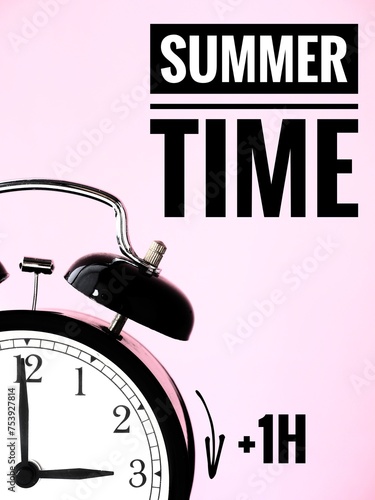 Alarm Clock at 3 o'clock changing to Summer Time.. Daylight Saving Time concept photo