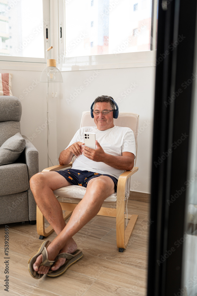 Man with smartphone and headphones. Man with smartphone and headphones.