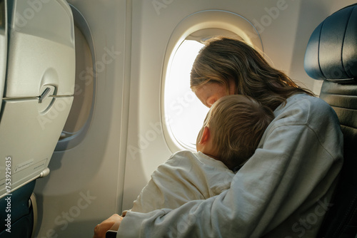 Mother And Son On Airplane photo