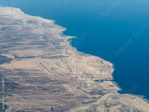 aerial landscape view of Egypt coastline around Marsa Alam in Al-Bahr al-ahmar, Egypt with Marsa Alam International Airport located near Port Ghalib
