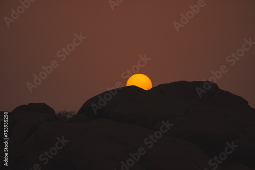 Magic orange sunset view.
A sunset is a natural phenomenon that occurs daily as the sun dips below the horizon, marking the end of daylight hours. It is a breathtaking and often picturesque event 