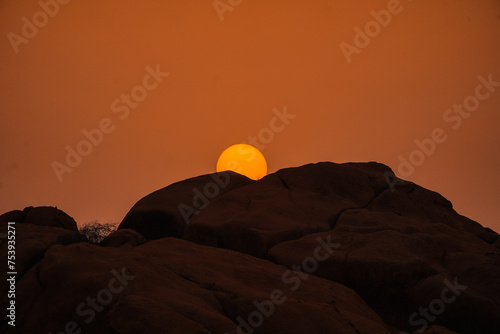 Magic orange sunset view.
A sunset is a natural phenomenon that occurs daily as the sun dips below the horizon, marking the end of daylight hours. It is a breathtaking and often picturesque event 