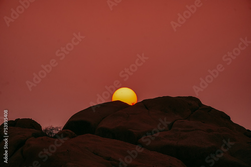 Magic orange sunset view.
A sunset is a natural phenomenon that occurs daily as the sun dips below the horizon, marking the end of daylight hours. It is a breathtaking and often picturesque event 