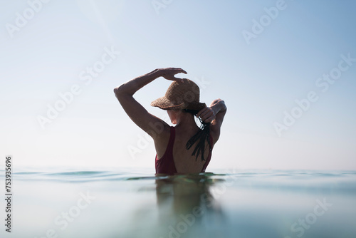 Woman enjoying pleasant sea bathe  photo