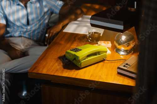 Wallpaper Mural A man is sitting at a desk in the office Torontodigital.ca