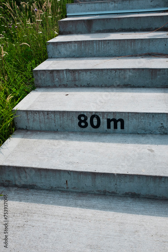 Concrete stairs with number symbol typographic mark 