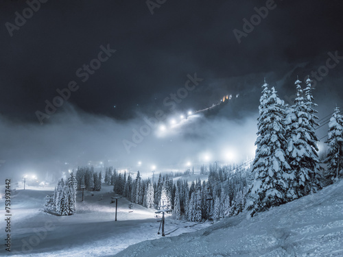 illuminated skiing resort at night photo