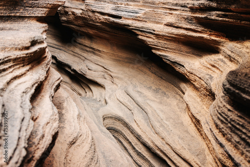 Detail of layered rock formation result of water and wind erosion photo