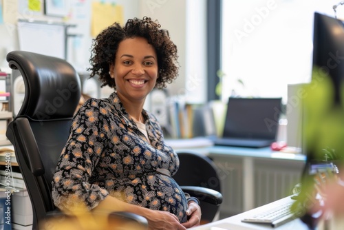 A content pregnant professional enjoys a moment of peace in her office, embodying the balance between her growing family and career.
