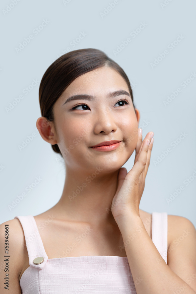 Beautiful Young asian Woman touching her clean face with fresh Beautiful Young asian Woman touching her clean face with fresh