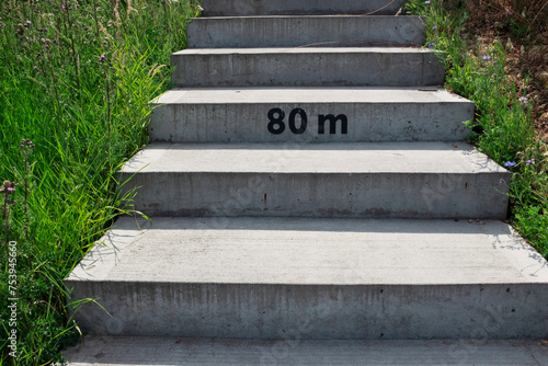 Concrete stairs with number symbol typographic mark 