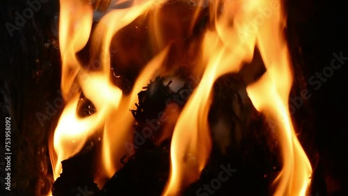 Close up of people burning plastic and paper waste