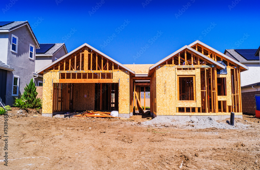 A new single-family home is under construction on the site located in Southern California, USA. A new single-family home is under construction on the site located in Southern California, USA.