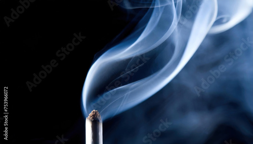 Close-Up of a Smoking Cigarette on a Dark Background