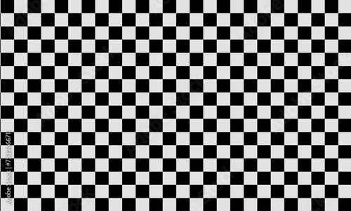 Classic black and white checkerboard pattern background. This timeless geometric design.
